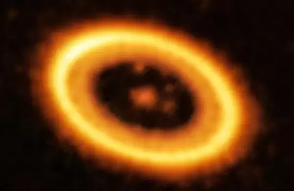 Descubren un paradojal "planeta doble" orbitando una estrella a 400 años luz de la Tierra