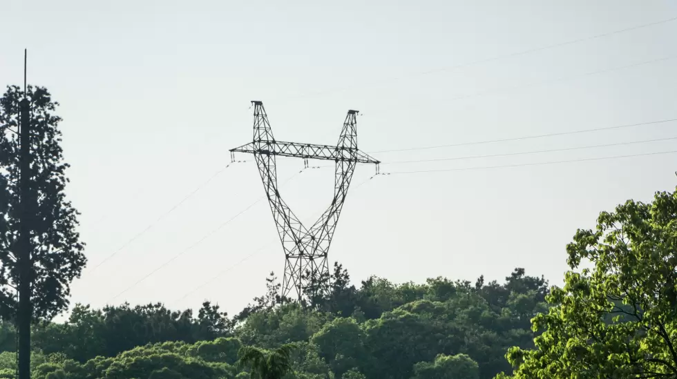 electricity-pylons-power-lines-sunset